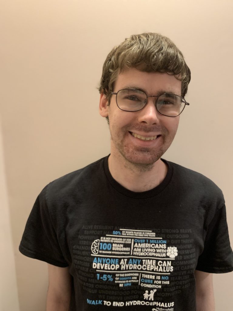 Michael, a young adult with hydrocephalus